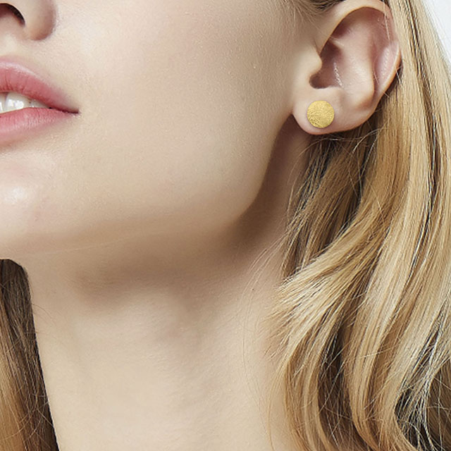 Geometric earrings round earrings, gold, silver, and rose gold. Fashionable women's earrings.