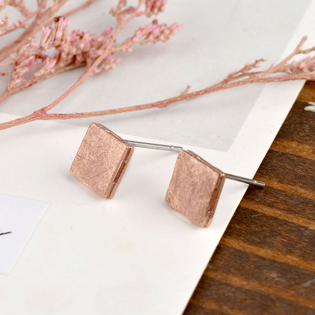 Geometric earrings square, gold, silver and rose gold. Fashionable women's earrings.